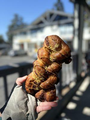 Pistachio layered pistachio croissant with pistachio drizzle? Yes.