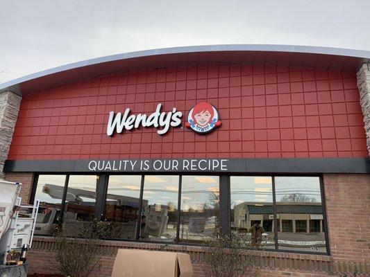 LED channel letters and lit "Quality is our Recipe" sign installed