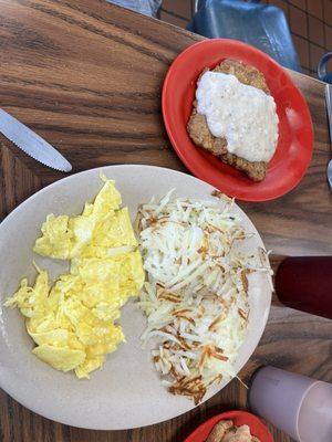 Chicken Fried Steak, scrambled eggs and hash browns