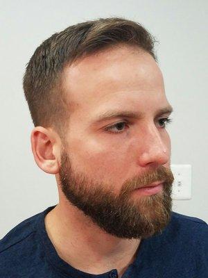 Logans art.  Gentle blent textured cut.  Modernized beard trim.  Style with character.