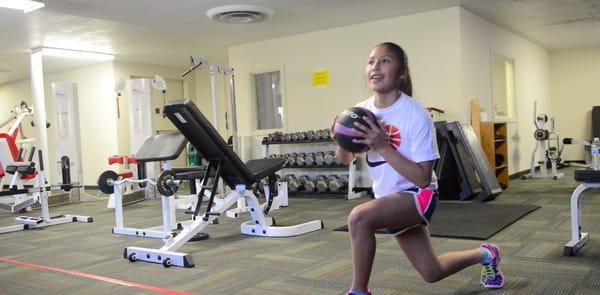 Point Guard improving her leg strength and core stability