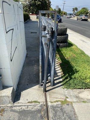 Gang slogan has been tagged and not removed. BROKEN GATE FOR YEARS. Not safe for tenants anyone can enter the premises