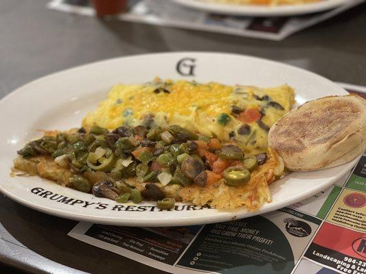 Veggie Omelette, hash browns loaded, eggs, and English muffin