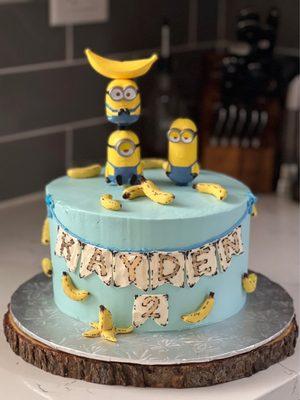 Funfetti-style cake with buttercream frosting, banana filling and fondant bananas