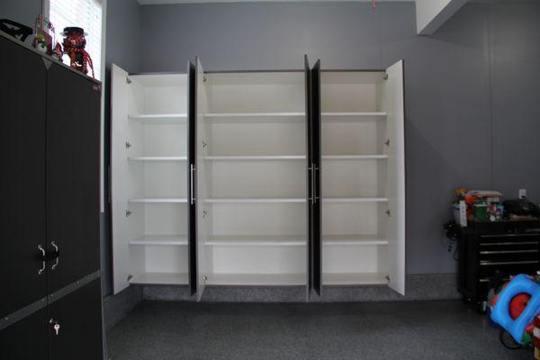 Pewter cabinets over full broadcast Granite chip floor (open).