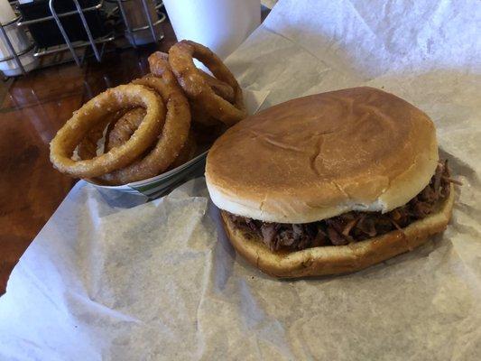 Brisket sandwich and onion rings