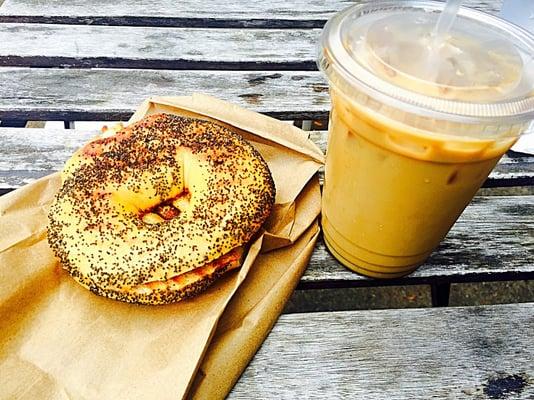 poppy seed bagel and iced soy macadamia nut latte