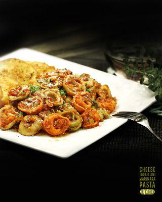 Cheese Tortellini Marinara Pasta. (670 Cal.)