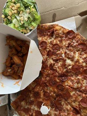 Cesar salad Buffalo wings-bone in Gigante cheese pizza with extra pepperoni and cheese.