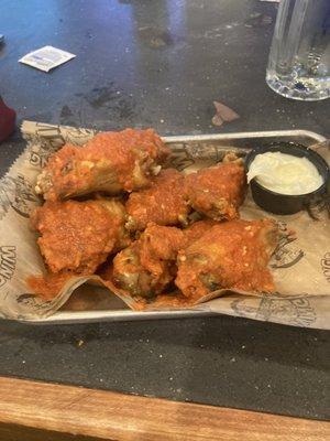 The wall habenero hot sauce with 7pc wings and blue cheese. Hot as hell