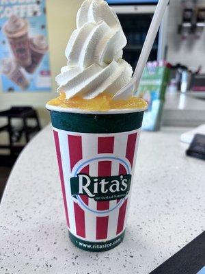 Mango Italian ice w/ the best custard in the world. Think.... frozen Italian soda.