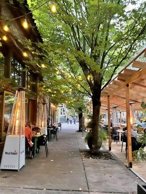 Outdoor seating. Fire heaters kept us comfortable on a rainy day!