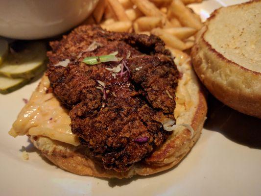 Close-up of the Nashville hot chicken sandwich with slaw on the side