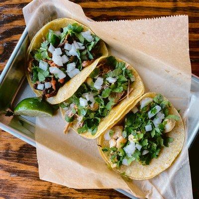 Street tacos de Pastor, Carnitas, y Polo -- $1 on Thursdays after 11am!