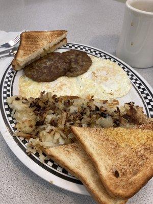 Eggs over easy with hashbrowns and sausage