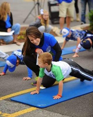 Miss Kelley Bettag helping OpFitness train one of BG's Little League teams.