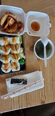 Gyoza, miso soup, and California roll.