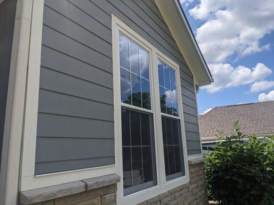 We installed new, energy efficient windows on this home.  James Hardie ColorPlus Fiber Cement Siding System, Crafted Stone Accent