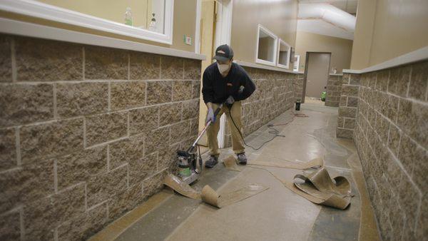 SERVPRO cleaning commercial building after a flood.