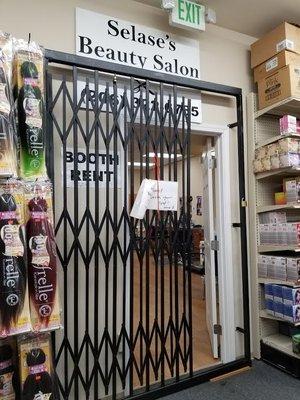 There's a connected hair salon in the back near the "hair for braiding" section