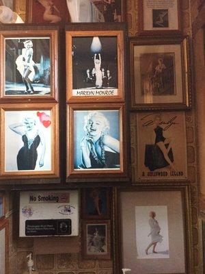 Floor to ceiling, 4 walls of Marilyn pics in the men's room.