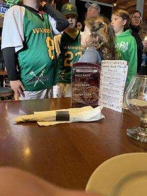 Baseball team waiting right next to my table