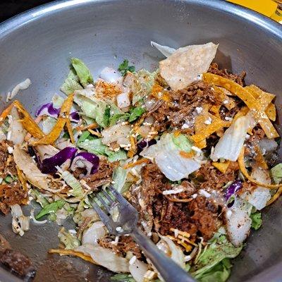 Half eaten brisket salad