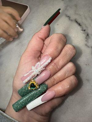 Green nails sparkly glittery green nails with Christmas bowl 3-D sweater design done in acrylic built a gel or gel Xpress on