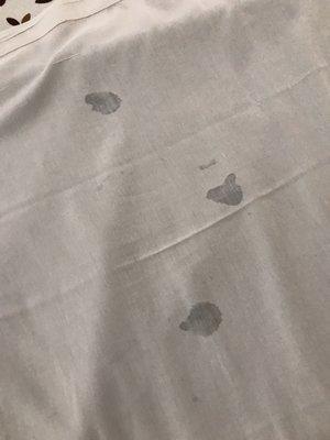 Stains on just made bed sheets