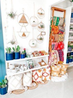 Local maker Braid and Wood featured on this wall with her gorgeous handmade plant hangers