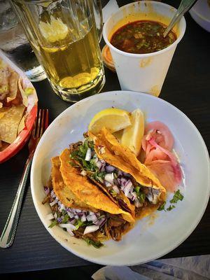 Birra tacos and dipping liquid