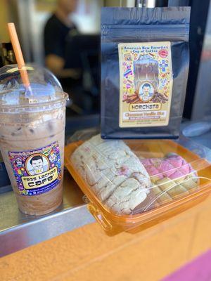 Mexican iced coffee (cafe de olla) a bag of cinnamon vanilla ground coffee & some fresh baked panecitos