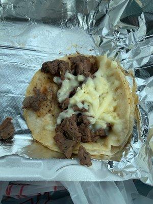 Steak Mexican Taco with Cheese. No onions or cilantro.