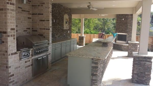 Custom patio with built in bbq pit and cabinets