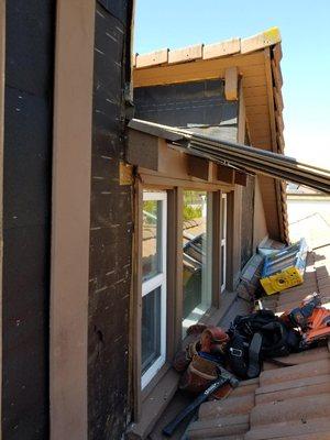 Second-story reframing window and siding plus beam tail replacement