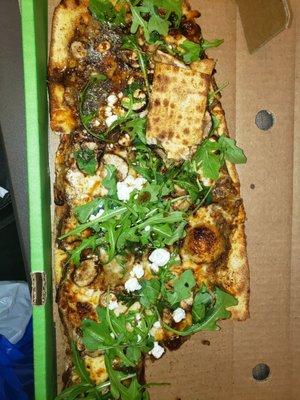 Wild Shrooms: balsamic/mushroom truffle sauce, smoked gouda, mozzarella, creminis w/ arugula, goat cheese & balsamic drizzle.