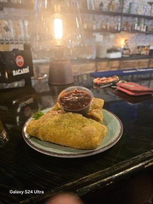 Brisket and Mac and cheese egg roll with  home made Cajun/Onion Jam barbecue sauce!!!