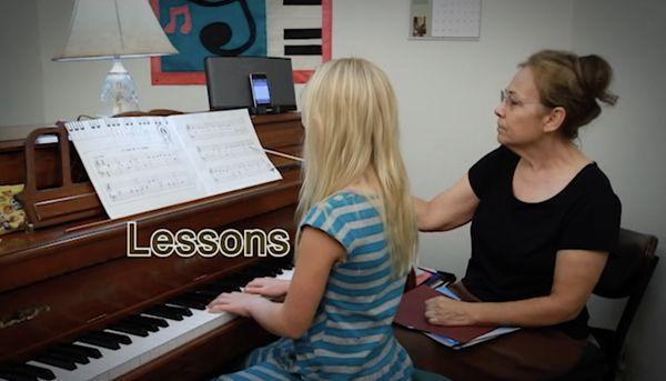 Piano Lesson in progress with instructor,  Carleen Darrow and student.