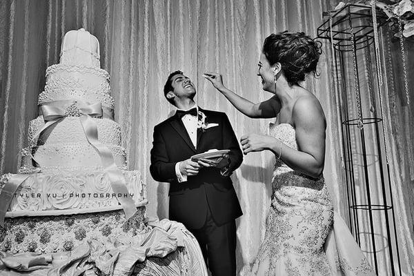 Bride and Groom Cutting the Cake