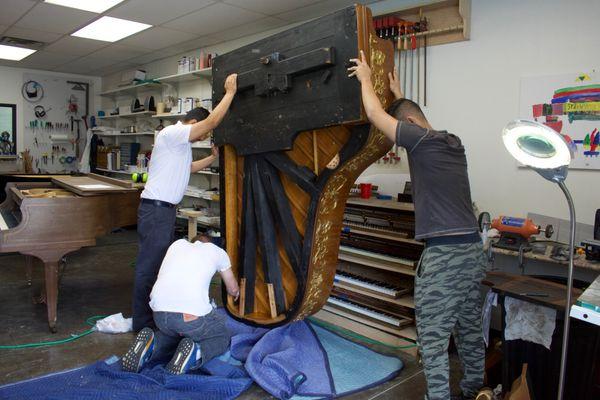 Part of the repair process on the Hamburg Steinway pictured earlier.