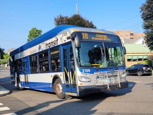 Glory Days is the place in the background with the shades half down as a CTTransit route 311 bus works toward Stanford