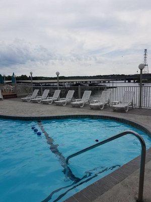 Pool deck, marked off shallow end for kiddos and a view of the water.