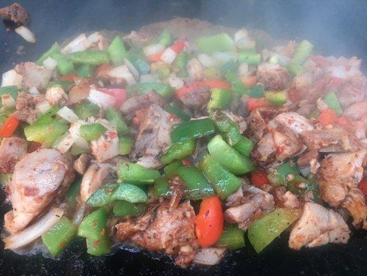 Smittys Chicken Bentos sautéed with green and red peppers and onions...