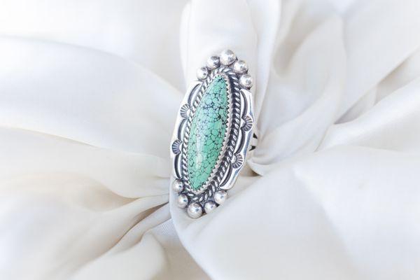 Local legend L7 has an ever changing collection of new and vintage turquoise rings, cuffs, necklaces, and earrings.