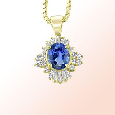 14k.y. gold with an oval sapphire with baguette diamonds