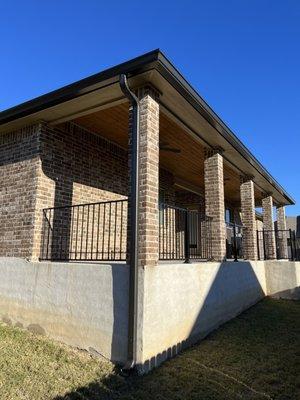 Seamless rain gutters with down spout