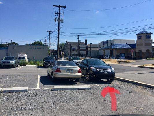 Notice this spot has no concrete stop? Because it is not a parking space!