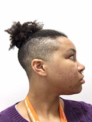 Shaved sides and back with the length on top preserved