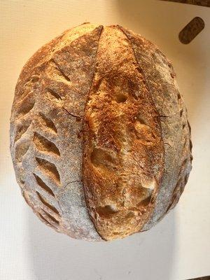 Beautiful sourdough loaf that was so light and fluffy inside. Beef pelmeni was also delicious!