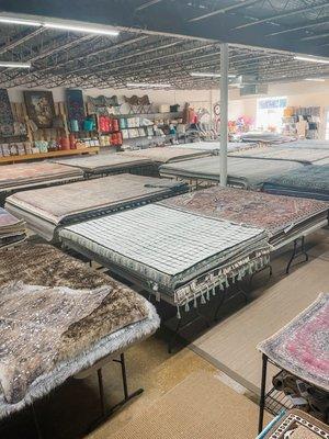 We have over 800 rugs in store to feel and see.